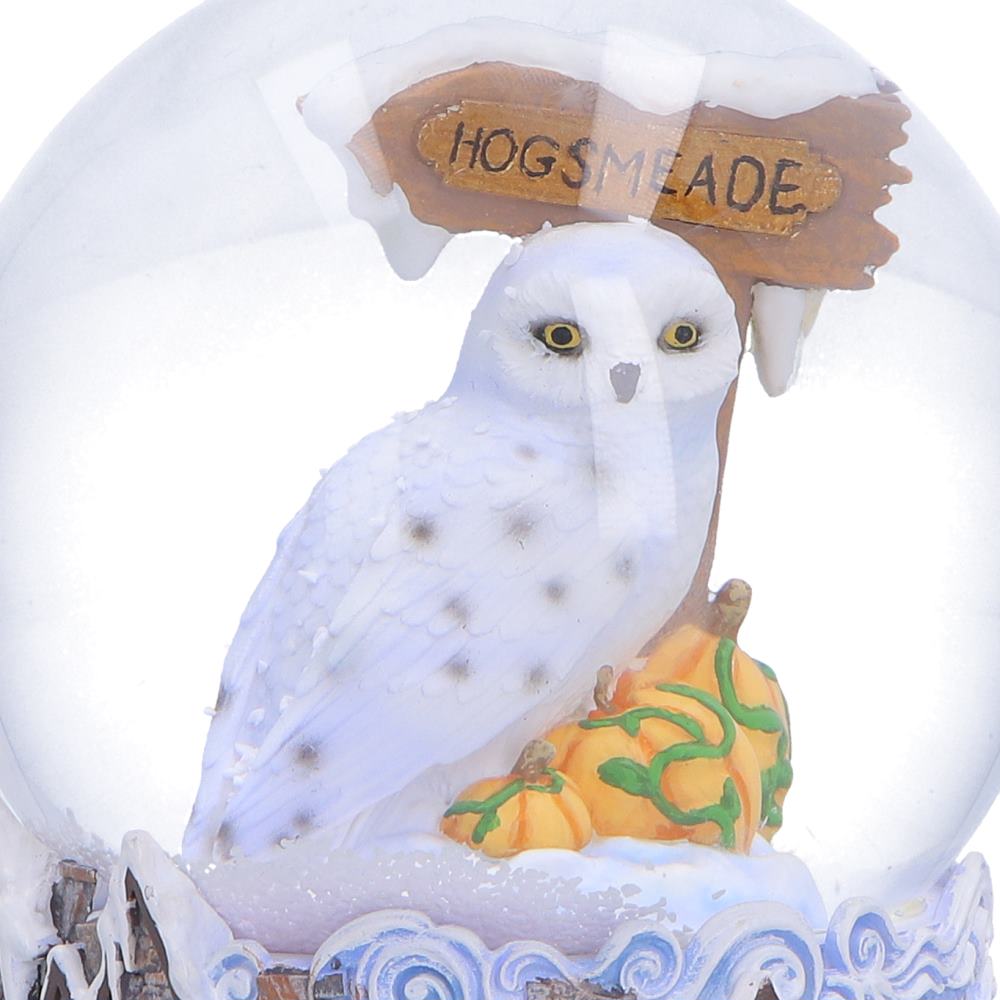 Harry Potter Hogsmeade Village snow globe by Nemesis Now featuring detailed village scene inside a 14.6cm glass globe.