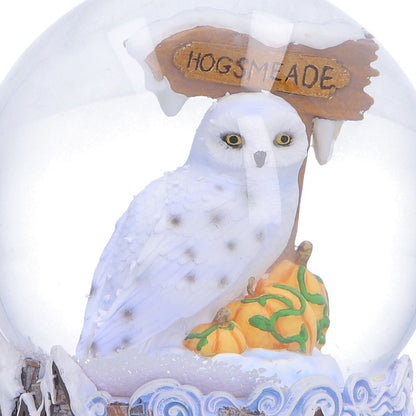 Harry Potter Hogsmeade Village snow globe by Nemesis Now featuring detailed village scene inside a 14.6cm glass globe.