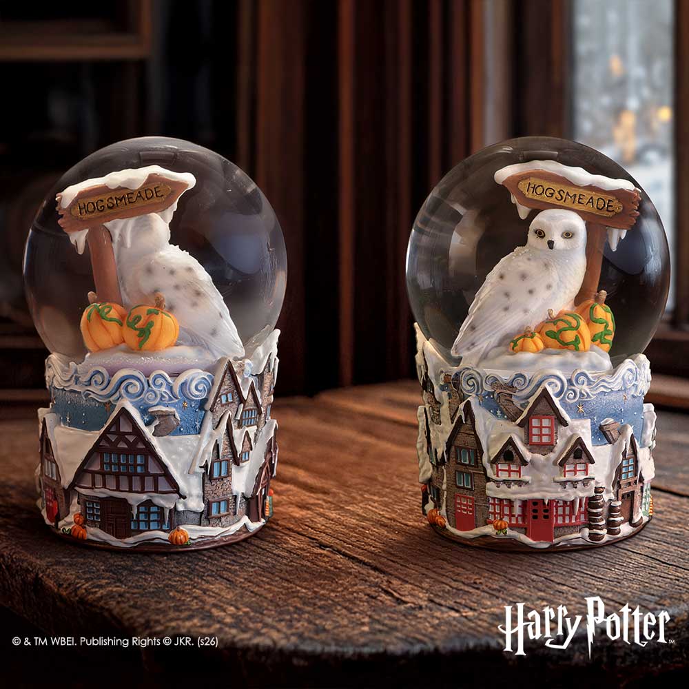 Nemesis Now Harry Potter Hogsmeade Village snow globe, 14.6cm, featuring detailed wizarding village scene inside a glass globe.