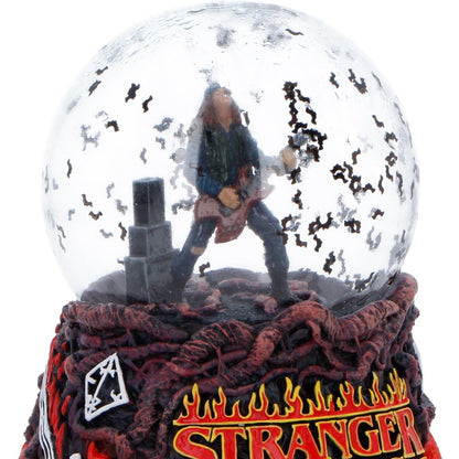 Nemesis Now Stranger Things Eddie’s Sacrifice snow globe, 14.5cm with detailed scene and characters inside.