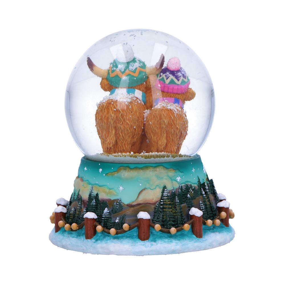 Winter Highland Cow snow globe by Nemesis Now, 13.7cm tall, featuring a Highland Cow figure inside a glass globe with snowy scene.