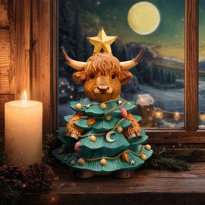 Winter Highland Cow Tree figurine by Nemesis Now, a 13.5cm decorative ceramic sculpture featuring a Highland cow in winter attire.