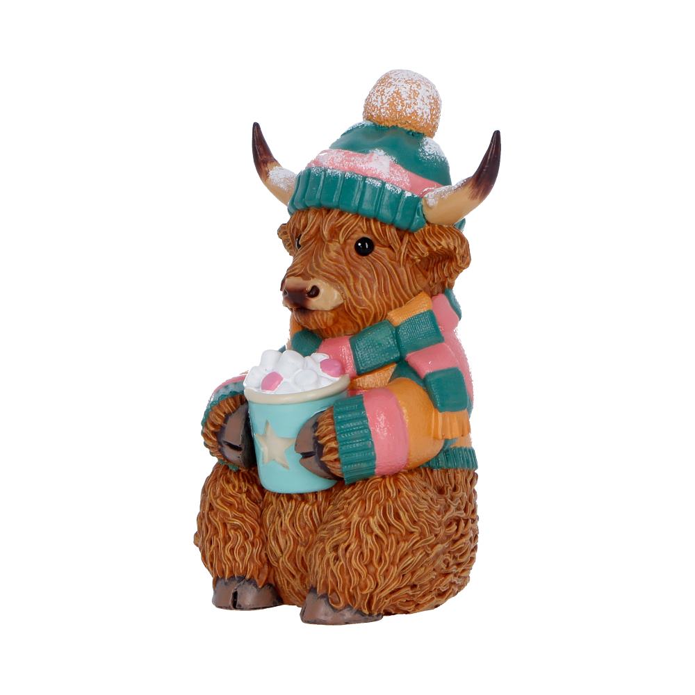 Nemesis Now Winter Highland Cow figurine, 12.3cm tall, detailed Highland cow sculpture in winter-themed design.