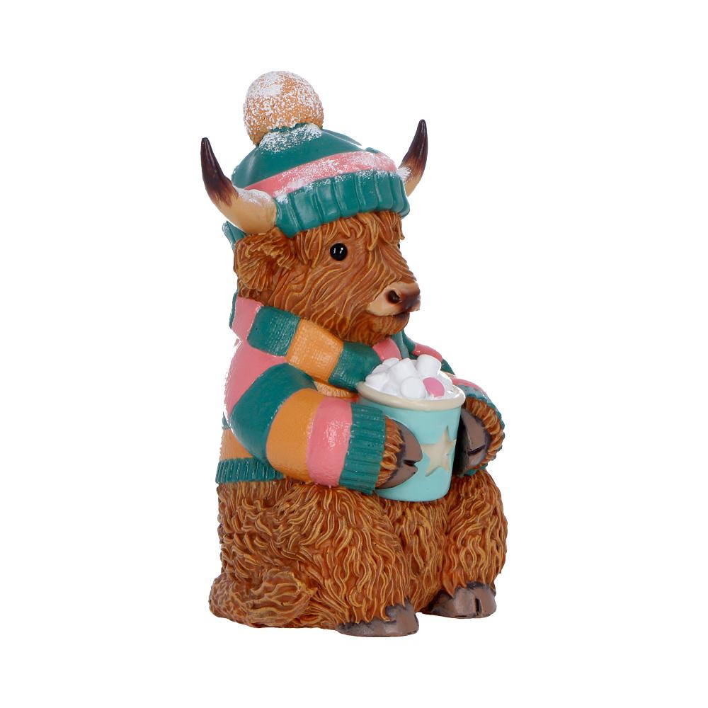 Winter Highland Cow hot cocoa figurine by Nemesis Now, 12.3cm tall, detailed Highland cow with a cozy winter theme.