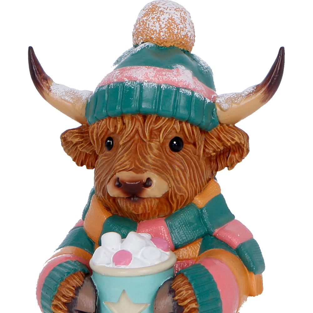 Nemesis Now Winter Highland Cow figurine, 12.3cm, detailed ceramic hot cocoa-themed decorative sculpture.