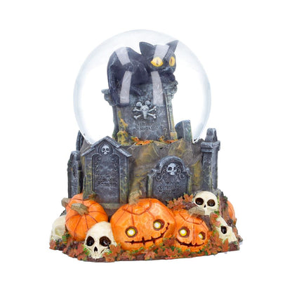 Nemesis Now Halloween pumpkin patch cat snow globe, 15.4cm tall, featuring a festive autumn scene with a cat and pumpkins.