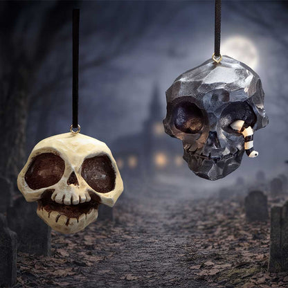 Set of two Grim and Grin hanging ornaments from Nemesis Now, featuring detailed, creepy face designs on 5.2cm decorative hanging ornaments.