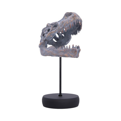 Nemesis Now T. Rex skull figurine on plinth, detailed dinosaur skull replica, measures 24.2cm, ideal for collectors or display.