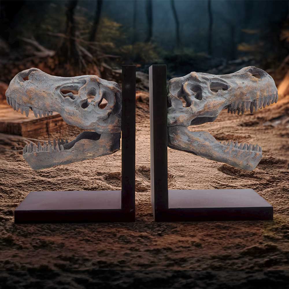 Nemesis Now T. Rex skull bookends, 17.1cm tall, featuring detailed dinosaur skull design for book organization and decor.