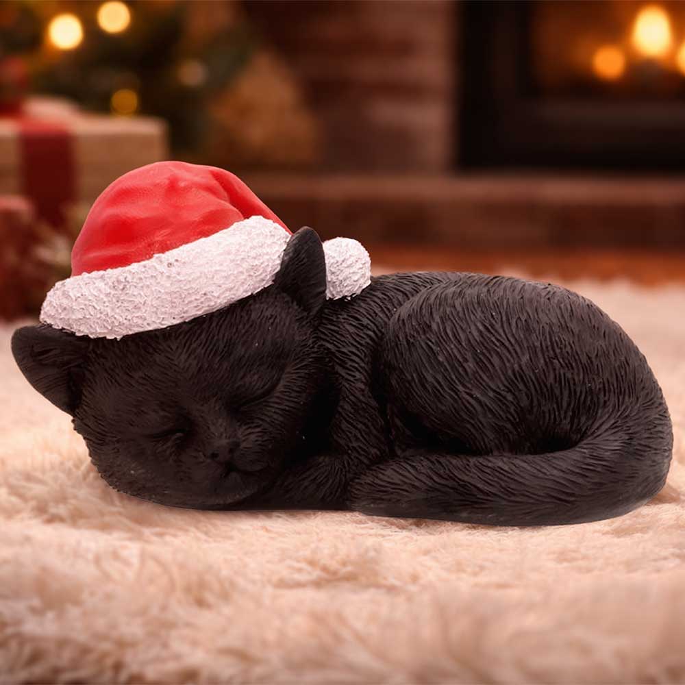 Nemesis Now Merry Whiskers 9.5cm figurine showcasing a charming, detailed feline character in a festive pose.