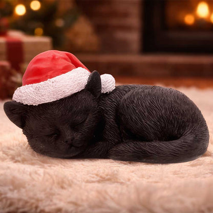 Nemesis Now Merry Whiskers 9.5cm figurine showcasing a charming, detailed feline character in a festive pose.