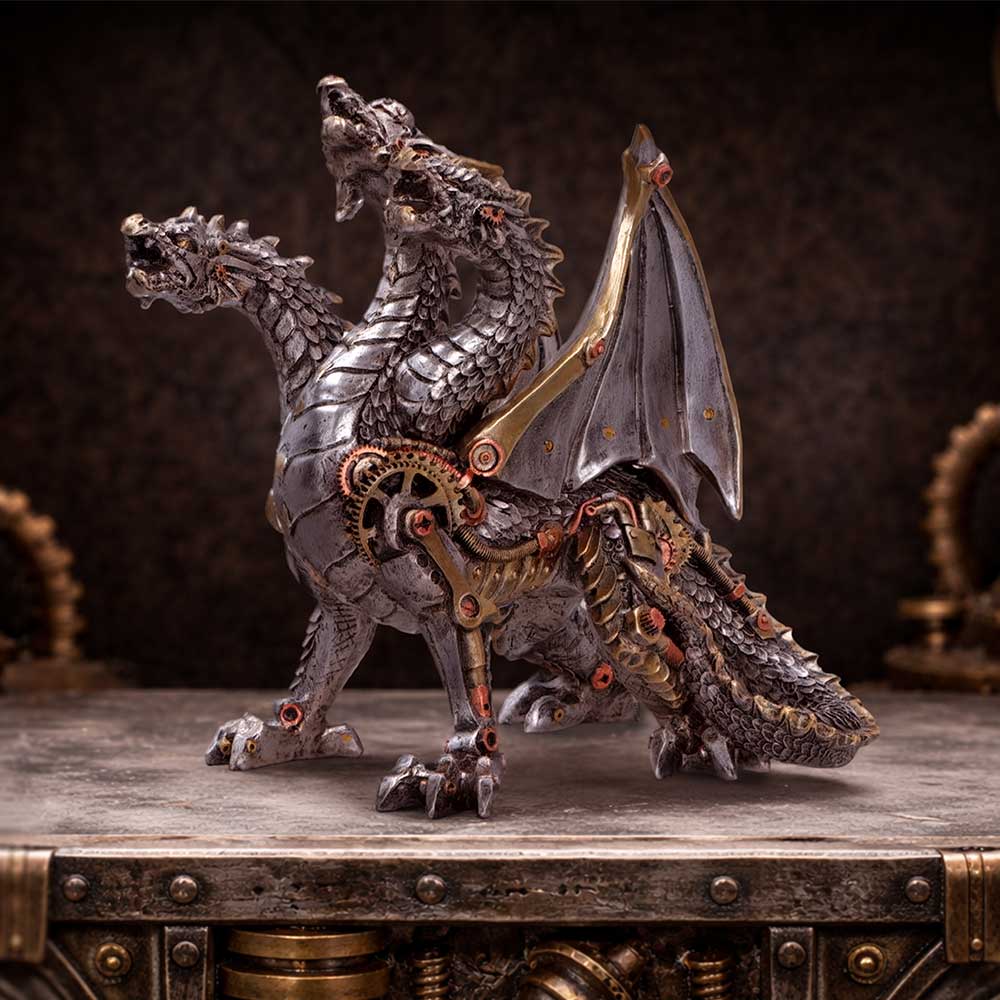 Nemesis Now Cogwork Trinity figurine, a detailed 23cm steampunk-inspired mechanical sculpture with intricate gears and metalwork.