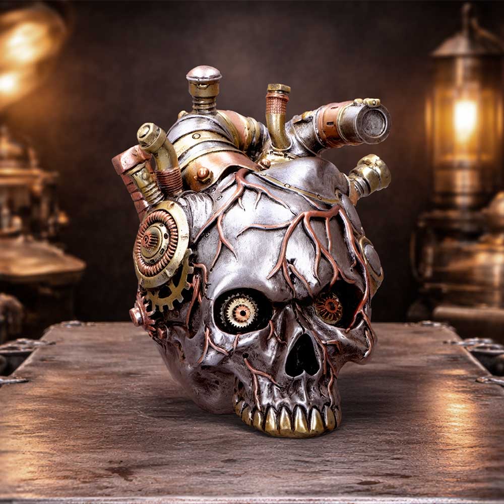 Silver Cardiac Cranium figurine by Nemesis Now, 17.5cm tall, detailed skull sculpture with intricate design features.