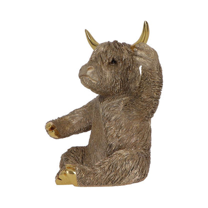 Gold Highland Cow wine bottle holder by Nemesis Now, 26.8cm tall, featuring a detailed Highland cow design for wine display.