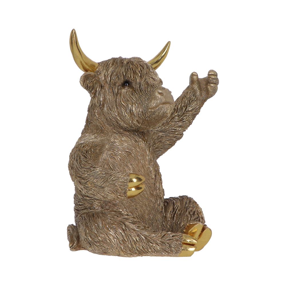 Gold Highland Cow wine bottle holder by Nemesis Now, 26.8cm tall, featuring a detailed highland cow sculpture holding a wine bottle.