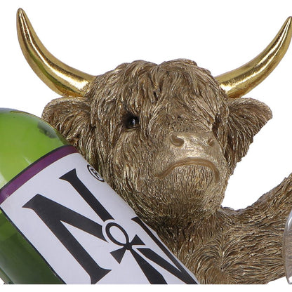Gold Highland Cow wine bottle holder by Nemesis Now, 26.8cm tall, featuring a detailed highland cow design holding a wine bottle.